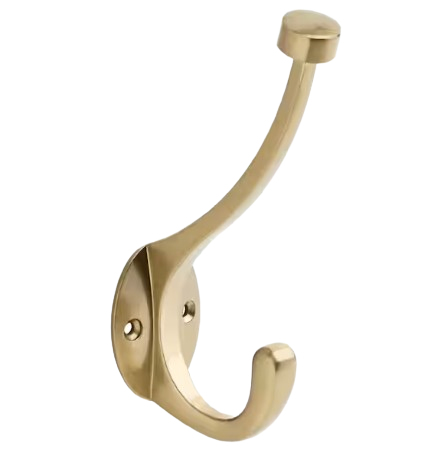Set of golden bronze decorative wall hooks with curved double-prong design, mounted individually for hanging coats, bags, and scarves in an entryway.