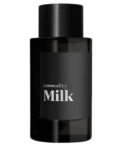 Commodity Milk Expressive Eau de Parfum in a matte black bottle, a cozy scent featuring marshmallow, milk notes, mahogany wood, and warm musk.