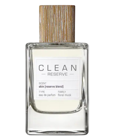 CLEAN RESERVE Skin Eau de Parfum in a clear bottle with wooden cap, a soft skin scent combining musk, vanilla, and subtle floral notes.