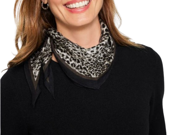 Talbots swirly animal print diamond scarf in neutral tones, styled around the neck over a black top.