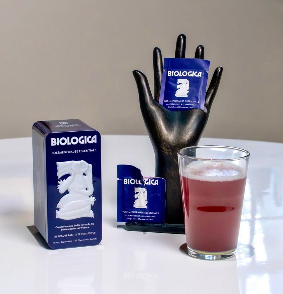 Biologica Postmenopause Essentials tin containing 30 sachets of bone health and energy support supplements