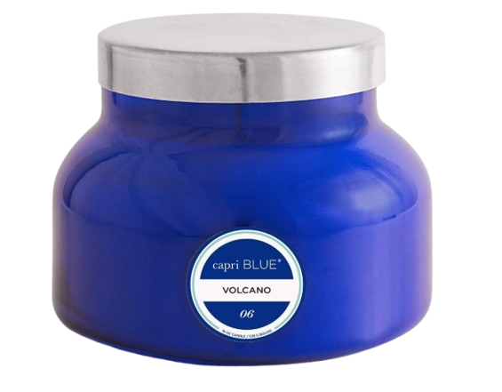 Capri Blue Volcano candle in a vibrant cobalt blue glass jar with silver lid. Signature citrus-sugar fragrance housed in a glossy, statement-making container.