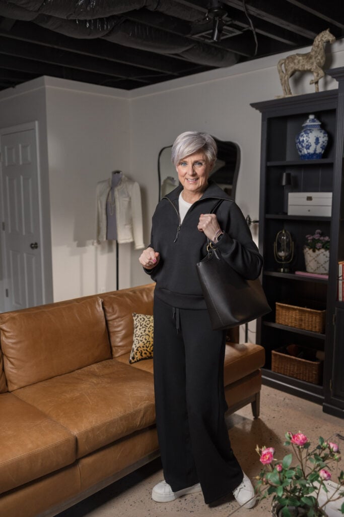 all black athleisure outfit women over 50 — Spanx matching set with leather tote