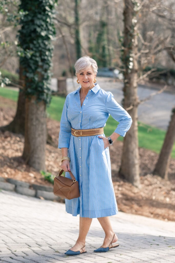 Beth wearing a midi poplin shirtdress