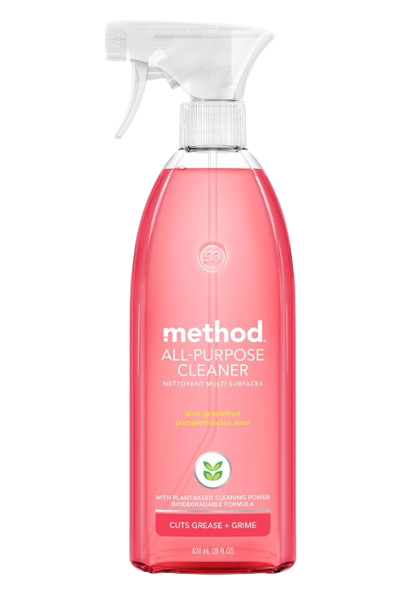 Clear spray bottle of Method all-purpose cleaner in pink grapefruit scent, filled with bright pink liquid and labeled for cutting grease and grime on household surfaces.