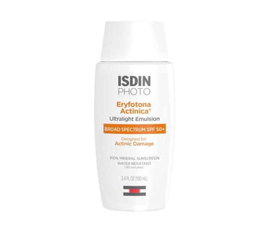 ISDIN Eryfotona Actinica Ultralight Emulsion SPF 50+ in white bottle with orange and gray labeling, shown with a mineral sunscreen texture swatch behind it, designed for actinic damage and sun protection.