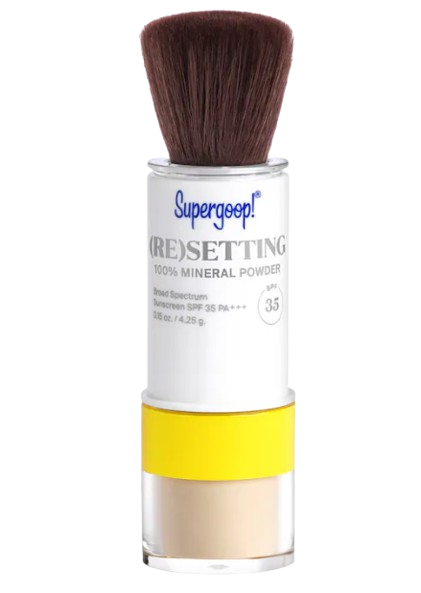Supergoop! (Re)setting Mineral Powder SPF 35 in refillable brush applicator with yellow accent band, 100% mineral sunscreen powder for on-the-go touch-ups.