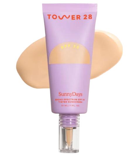 Tower 28 SunnyDays Tinted Sunscreen Foundation SPF 30 in lavender tube with pump dispenser, shown with creamy beige foundation swatch, lightweight tinted broad spectrum sunscreen for everyday wear.