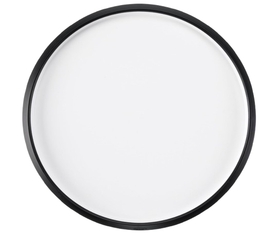 Round OXO Good Grips Lazy Susan turntable with white surface and black non-slip rim, designed to rotate smoothly for easy access to pantry items and condiments.