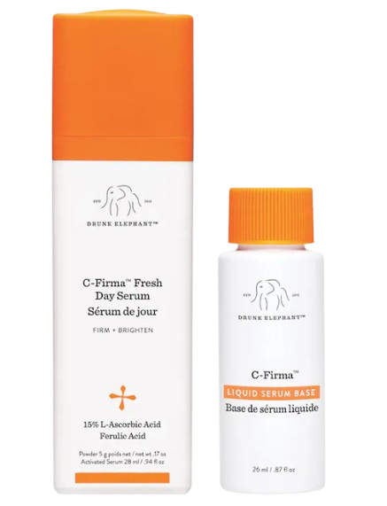 Drunk Elephant C-Firma Fresh Day Serum vitamin C treatment featuring separate liquid serum base and powder activator bottles, formulated with 15% L-ascorbic acid to brighten, firm, and improve skin radiance.