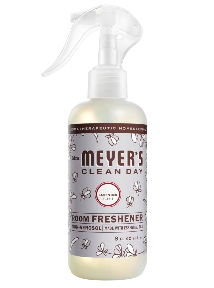 Mrs. Meyerβs Clean Day lavender linen spray in a clear plastic bottle with trigger nozzle, labeled with floral illustrations and made with essential oils for a fresh, calming scent.