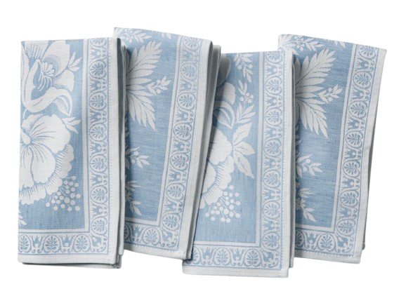 Set of four Williams Sonoma vintage floral jacquard napkins in soft blue and white, featuring an intricate woven botanical pattern with decorative borders for an elegant, classic table setting.