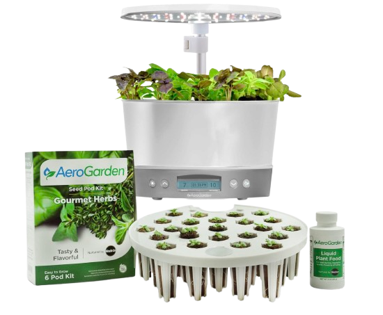 Compact AeroGarden Harvest indoor hydroponic system with LED grow light, herb seedlings growing in pods, digital control panel, and included gourmet herb seed kit and liquid plant food.