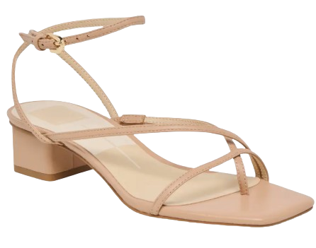 Dolce Vita Karlos ankle strap sandals in light tan leather featuring thin minimalist straps, square open toe, adjustable ankle buckle, and a low block heel for a sleek, modern look.
