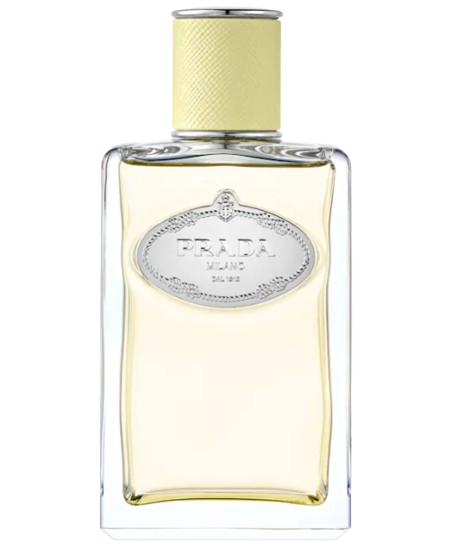 Prada Infusion de Gingembre perfume bottle in clear glass with pale yellow liquid, silver Prada Milano plaque, and textured yellow cap, citrus woody fragrance with ginger and vetiver notes.
