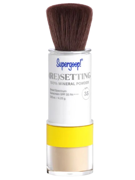 Supergoop! (Re)setting 100% Mineral Powder SPF 35 in portable brush applicator packaging for touch-up sun protection throughout the day.
