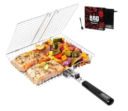 Stainless steel SHIZZO grill basket with folding grate and black handle filled with grilled salmon fillets and colorful vegetables including zucchini, peppers, onions, and lemon slices.