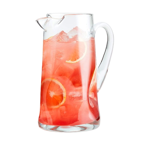 Clear glass pitcher filled with pink citrus punch, lemon slices, and ice cubes against a white background.