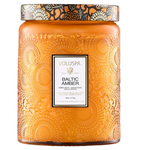 Voluspa Baltic Amber candle in an embossed amber glass jar with decorative floral lid and coconut wax blend fragrance.