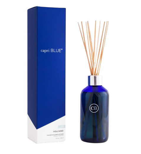 Capri Blue Volcano reed diffuser in a cobalt blue glass bottle with natural reeds and matching blue gift box.