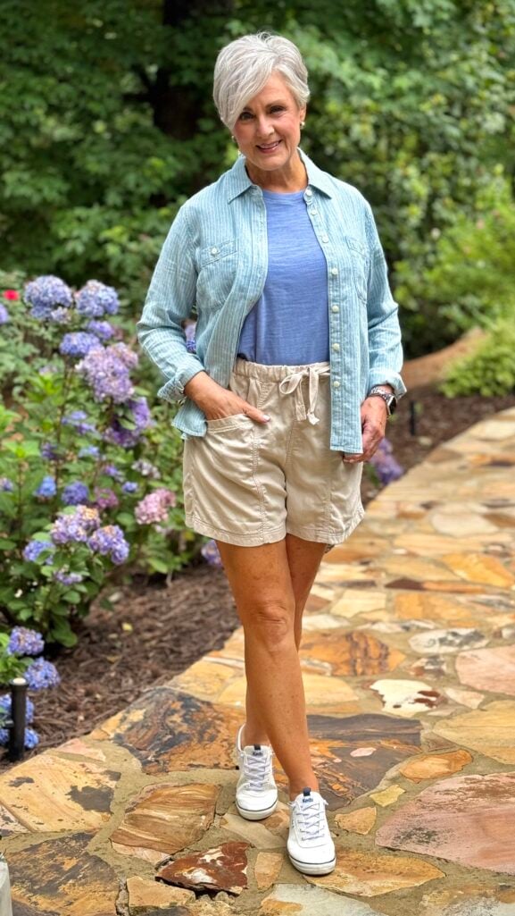 Beth Djalali in Faherty pull-on shorts, a slub tee, and white Keds sneakers