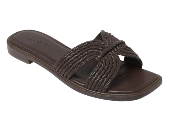 Dark brown flat slide sandal with wide woven straps in a knotted crossover design and a sleek square toe.
