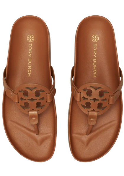 Cognac brown Tory Burch thong sandal featuring the signature laser-cut Double T logo and a cushioned footbed for all-day comfort.