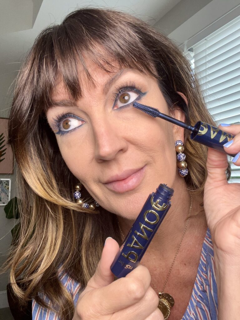 Navy blue mascara for a subtle patriotic makeup look over 50
