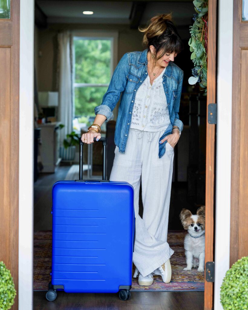 Cobalt blue Quince check-in suitcase for summer travel