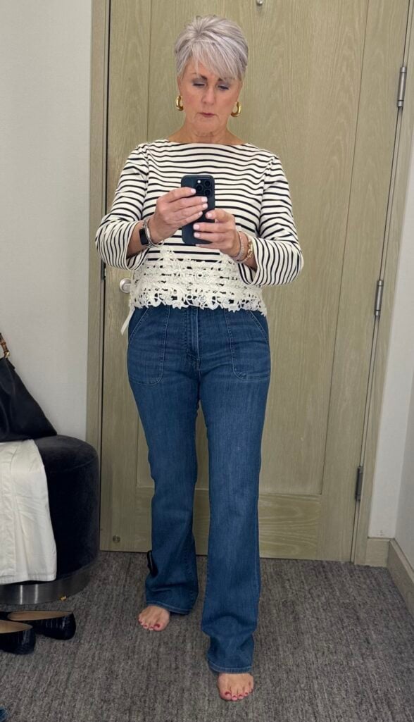 Frame Reboot Modern Pocket Bootcut: Woman over 50 wearing Frame Reboot bootcut jeans with a heel