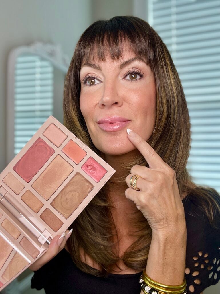 Wearing the deepest pink sheer lip color from the Laura Geller cream kit